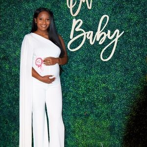 Club London brand Maternity jumpsuit . Only worn once at gender reveal !